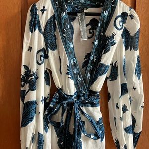 Beautiful Banana Republic wrap blouse with peplum.  New with tags.